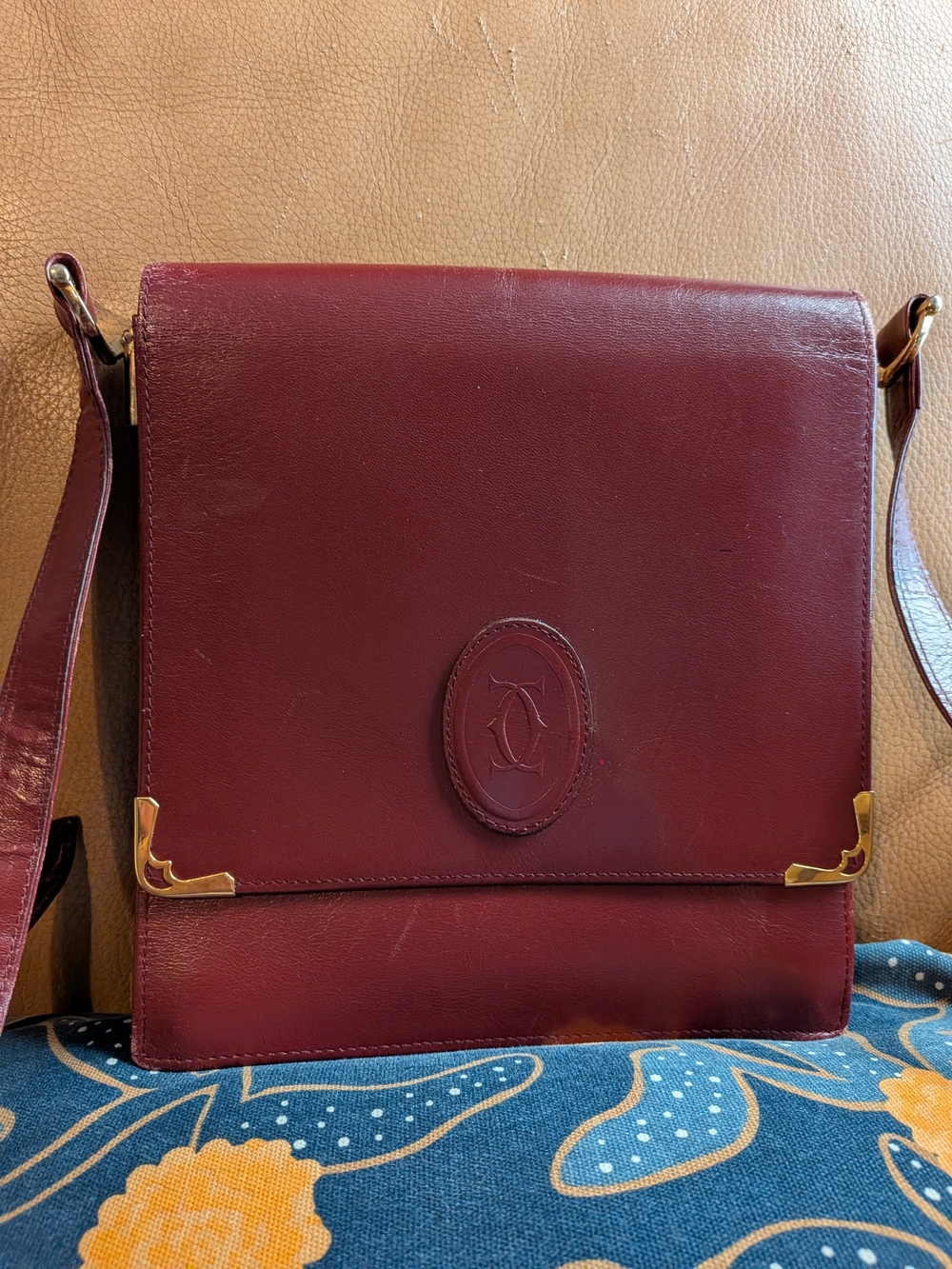 Cartier Burgundy Leather Messenger Bag with Gold Accents